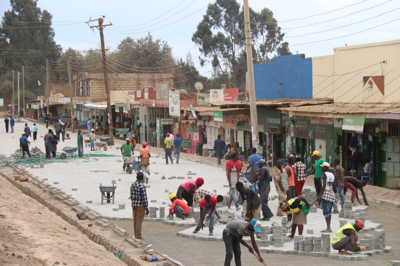 JOY AS TIMAU TRADERS ARE RESCUED FROM DRAINAGE NIGHTMARE